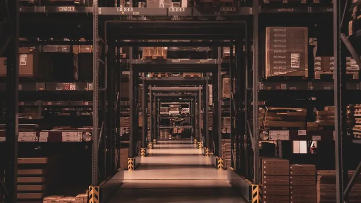 A wall of paper filing drawers