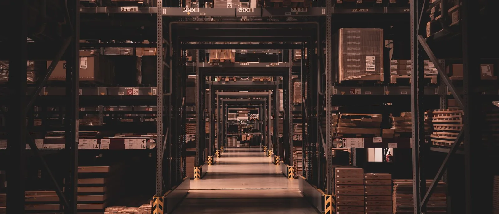 A wall of paper filing drawers